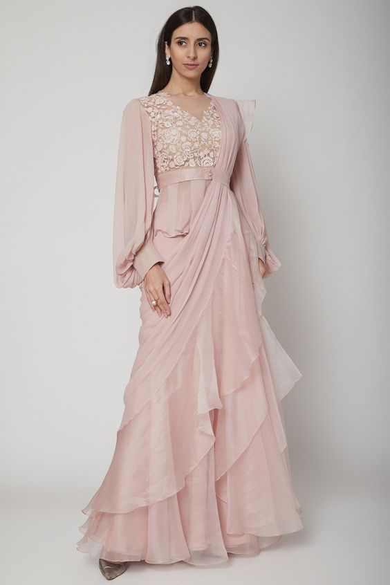 tailored gown with exaggerated sleeves