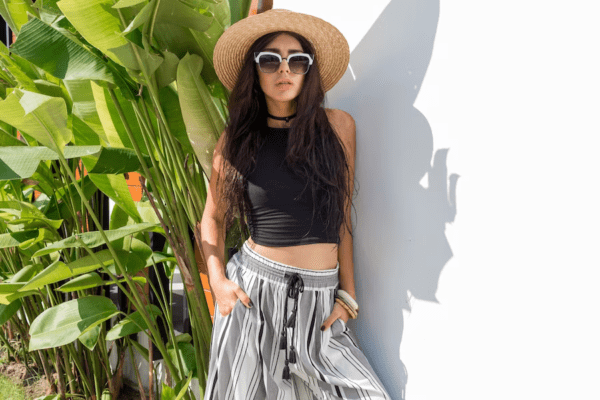https://needlesnthimbles.com/wp-content/uploads/2023/03/sexy-fashion-model-sunglasses-posing-green-tropical-plants-white-wall-wearing-stylish-summer-outfit-straw-hat-accessories_273443-3935.png