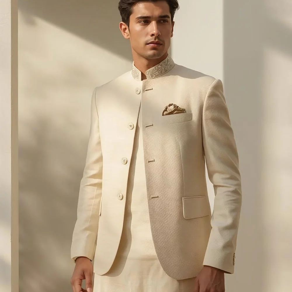 A classic kurta-pajama paired with a lightweight Nehru jacket creates an elegant yet breathable look for day wedding celebrations.